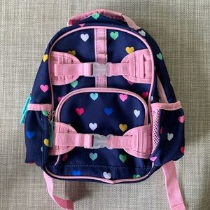 Pottery Barn Kids Mackenzie Small Backpack, Navy with multi colored hearts.